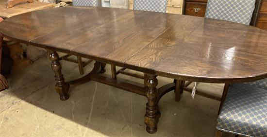 An early 18th century style French oak extending dining table, with two leaves, 268cm extended, width 120cm, height 75cm
